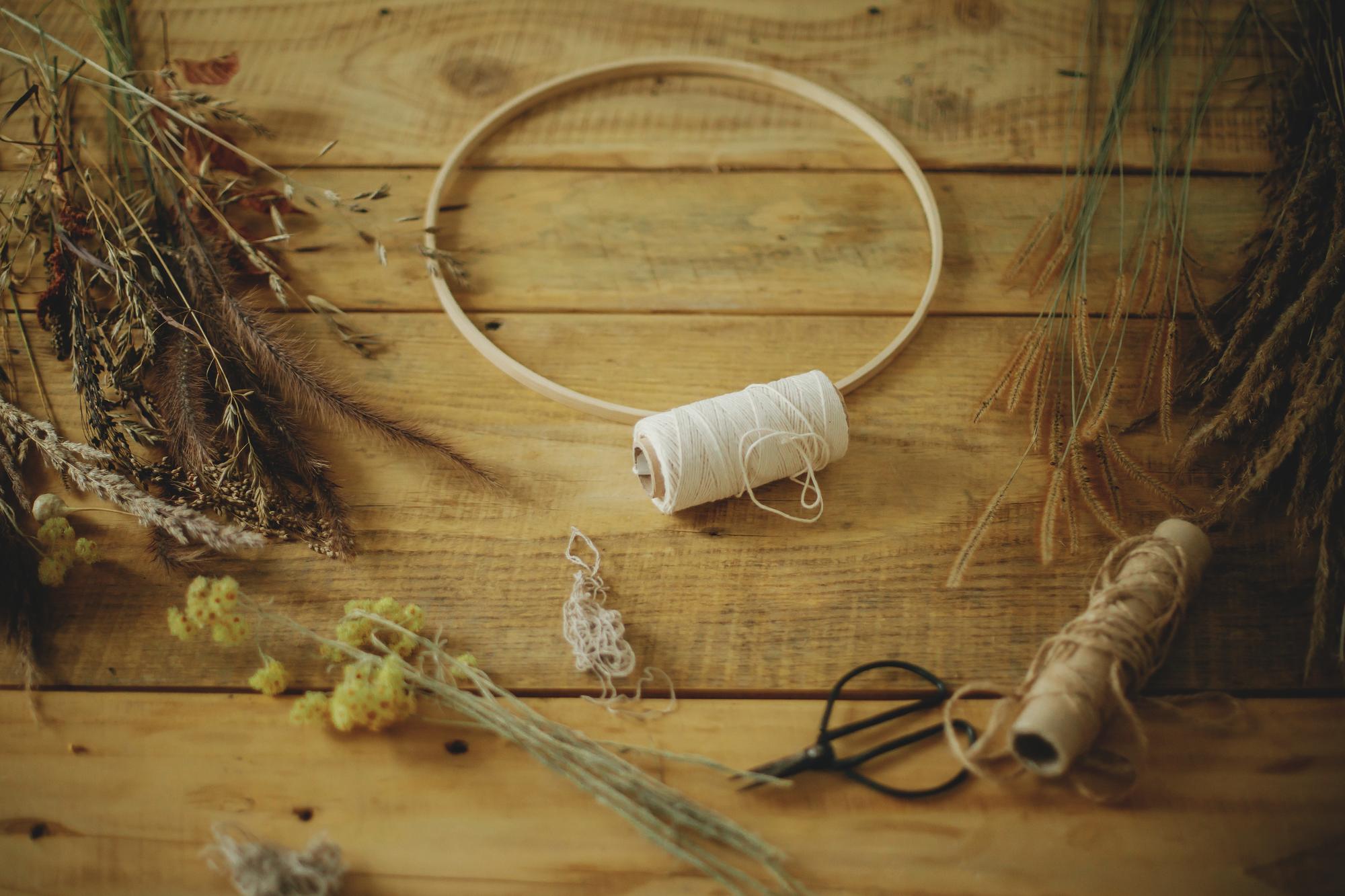 studio bench with threads and hoops arranged